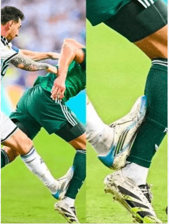 Still of a low sliding challenge near midfield